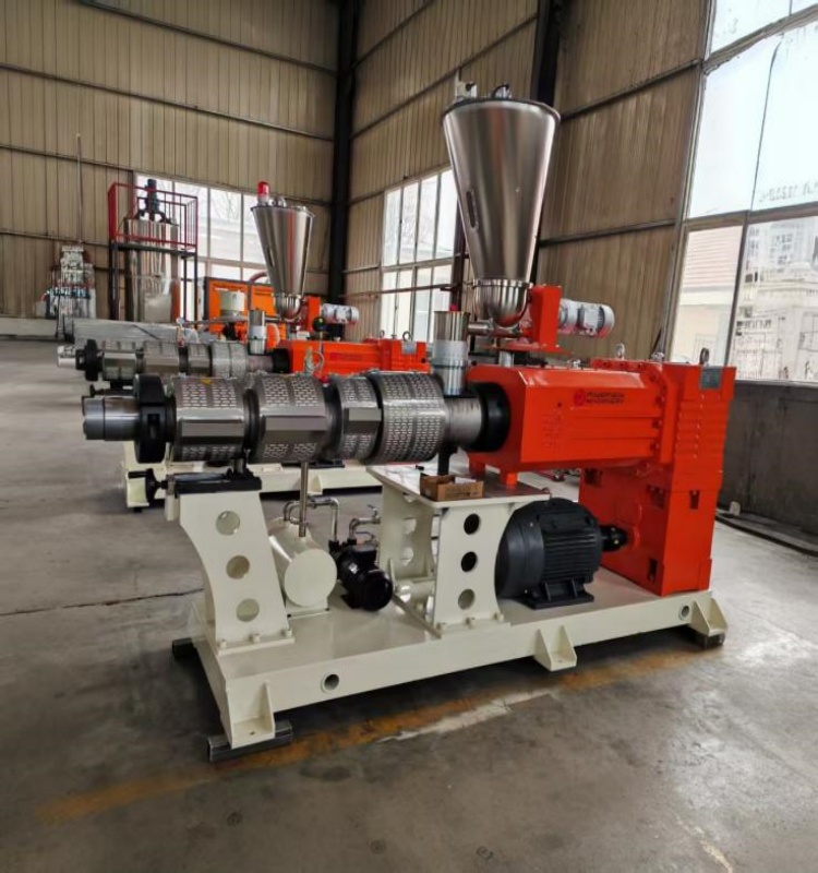 Vertical conical twin-screw extruder