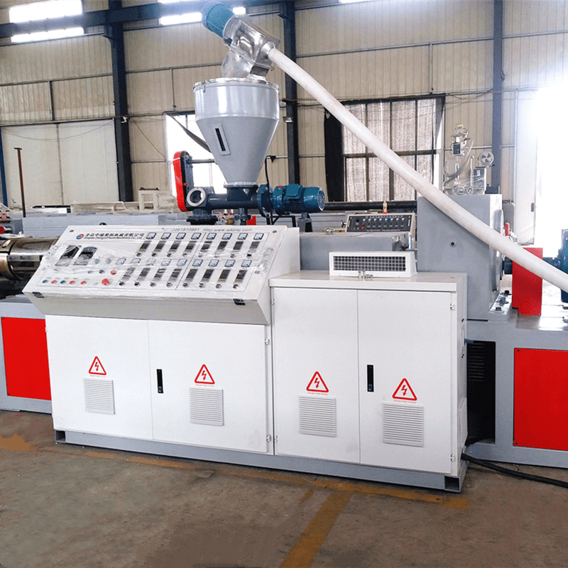 Precision machinery operating in a modern plastic manufacturing facility