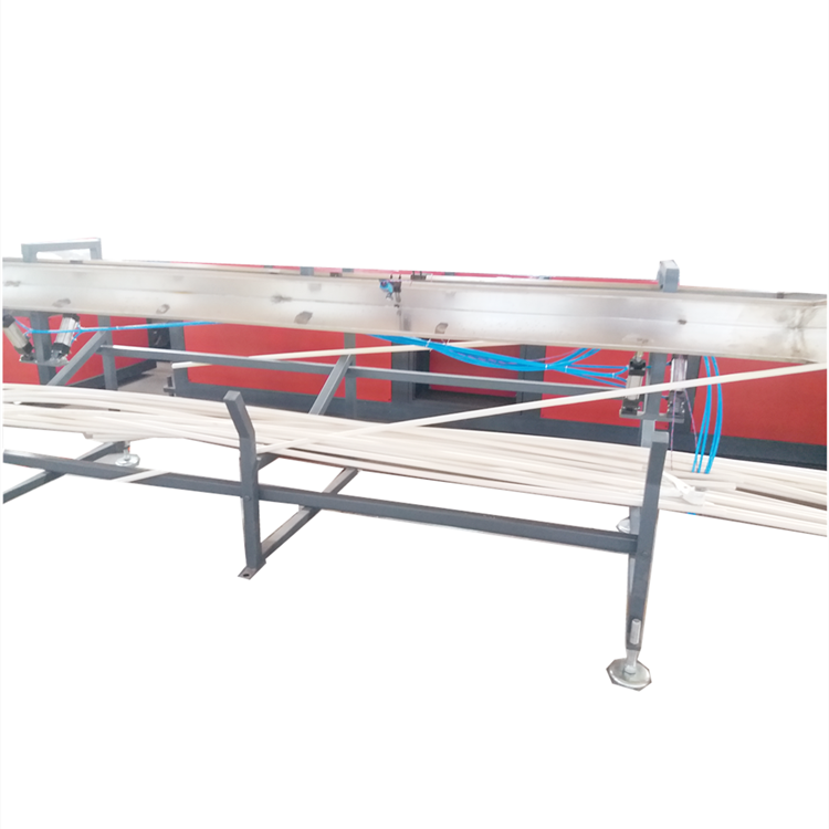Double tube unloading table for plastic pipe extrusion